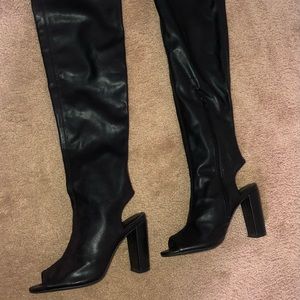 Used in great condition Over the knee faux leather boots.
